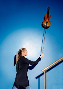 Viola player Gemma Dunne photographed at the Bridgewater Hall. Gemma is viola player with the Halle.