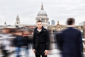 Conductor Greg Beardsell photographed on Millennium Bridge, London.
